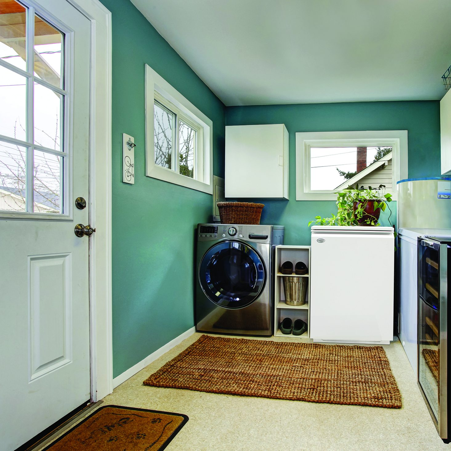 Laundry room with modern steel appliances Boiler Installations